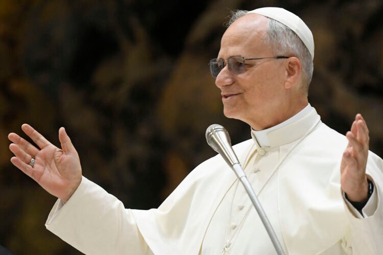 This handout made available by The Vatican Media on May 24, 2025, shows Pope Leo XIV greeting the Roman Curia and Vatican employees at The Vatican. Pope Leo XIV took his message of building bridges and promoting dialogue to the Roman Curia on May 24, in his first audience with members of the Catholic Church's governing body. (Photo by Andreas SOLARO / VATICAN MEDIA / AFP) / RESTRICTED TO EDITORIAL USE - MANDATORY CREDIT "AFP PHOTO / VATICAN MEDIA" - NO MARKETING - NO ADVERTISING CAMPAIGNS - DISTRIBUTED AS A SERVICE TO CLIENTS